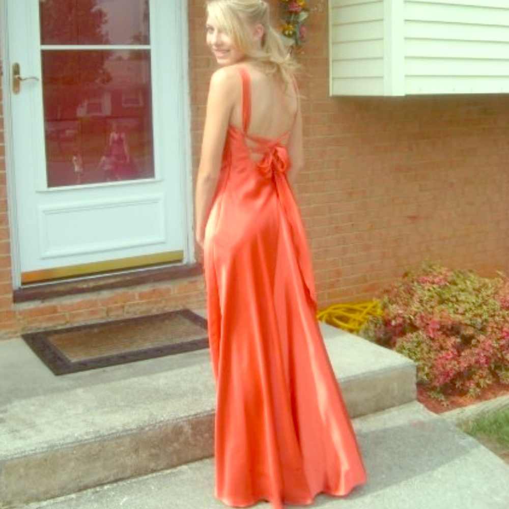 Beautiful jewel tone orange prom dress.